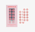 Dark spot remover patches from Topicals Faded showing the pink branded box alongside 20 individual round brightening patches on a white background.