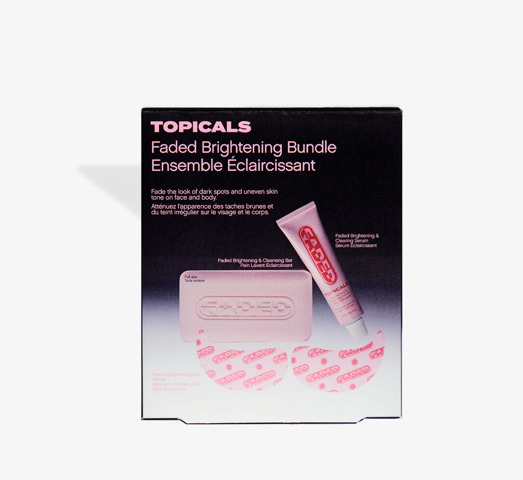 Brightening skincare gift set box from Topicals Faded showing the Faded Brightening Bundle packaging featuring the Cleansing Bar, Brightening Serum, and Eye Masks on a white background.